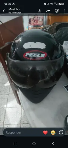 Capacete da marca Peels número 60 preto.