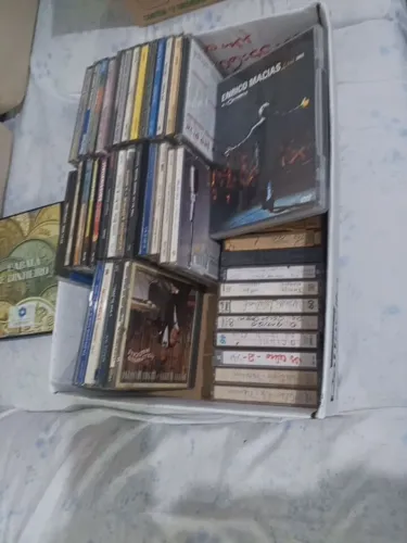 15Dvds orig. de filmes e de músicas/+70 Fitas vídeo casset+35 cds +15capas vídeo