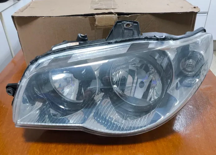 Farol lado motorista Fiat Palio sapão. ORIGINAL, sem detalhes 