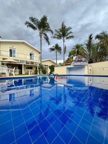Casa em Condomínio Residencial Portal do Copacabana com 4 suítes à venda, 765m2 por R$ 3.0