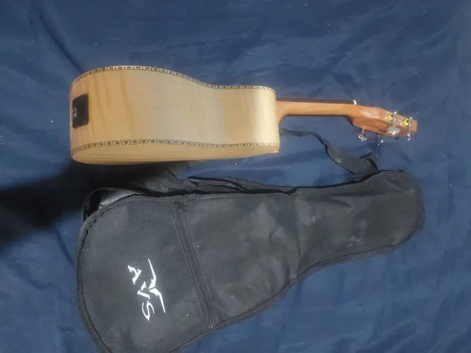 Vendo um cavaco malibu eletrico com afinador novo fone *