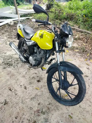 Vendo fan 150 bem conservada apenas com um débito 