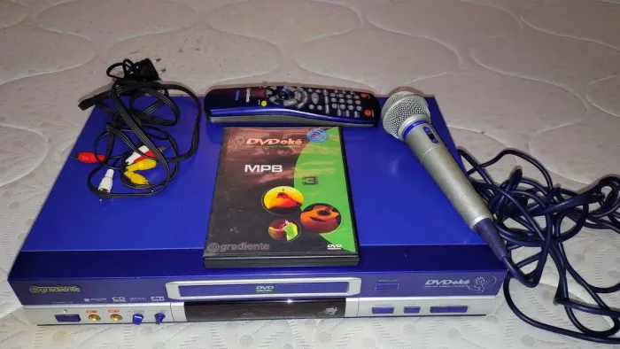 Dvd karaokê Gradiente K30 (Completo, com controle, microfone e dvdokê)