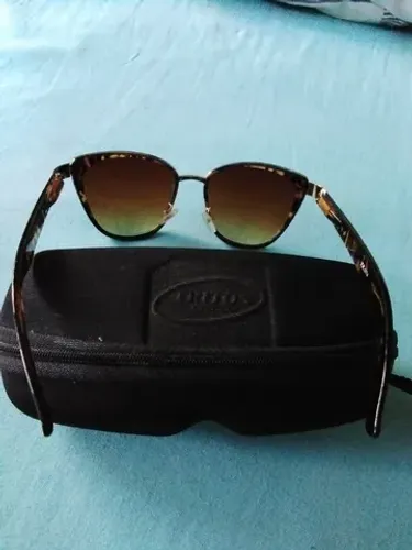 Oculos de sol feminino TRITON