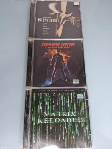 CDs de musica: MtvUnplugged, Demolidor e Matrix Reloaded