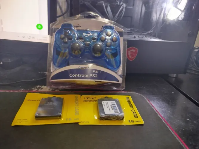 Controle Playstation 2 azul translúcido e memory card 16 megas 