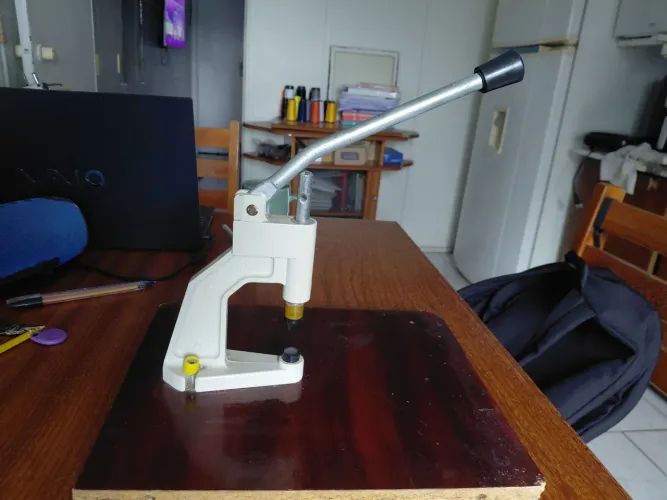 Máquina manual de pregar botão