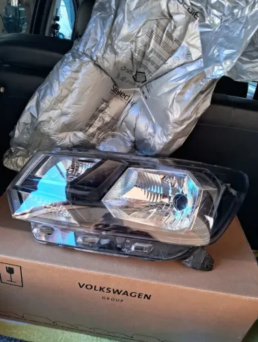 Farol Dianteiro Lado Esquerdo Máscara Negra Original VW Gol Voyage e Saveiro G8 20 até 23