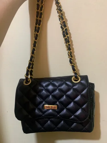 Bolsa de 170 por 80 reais. Bolsa de mão com qualidade ótima, usada uma vez