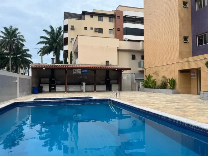 Apartamento na área nobre da Praia Grande a poucos metros do mar, com varanda gourmet - Ub