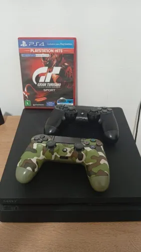Playstation 4, 1 T de memória, dois controles e um jogo( Gran Turismo)