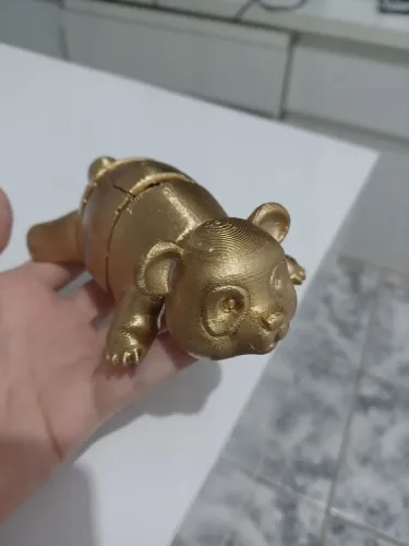 Decoração brinquedo panda dourado