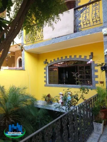 Sobrado com 4 dormitórios à venda, 200 m² por R$ 1.000.000,00 - Parque Continental II - Gu