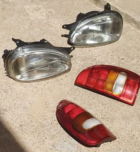 Farol de vidro, sinaleira traseira e para choque CORSA hatch 1998