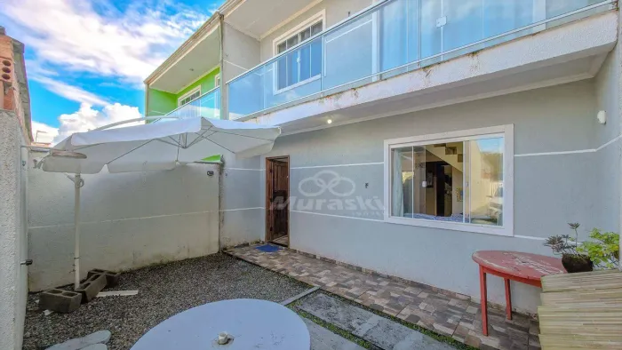 Sobrado com 4 dormitórios para alugar, 105 m² por R$ 2.500,00/mês - Coroados - Guaratuba/P