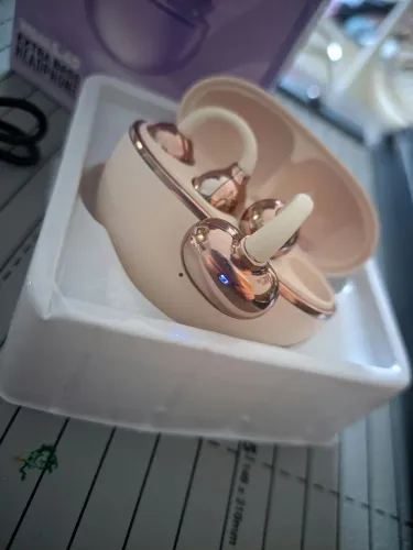Vendo fone de ouvido Clip dourado novo na caixa