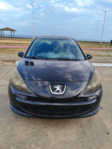 Peugeot 207 Sedan Passion XR 1.4 Flex 8V 4P 2013