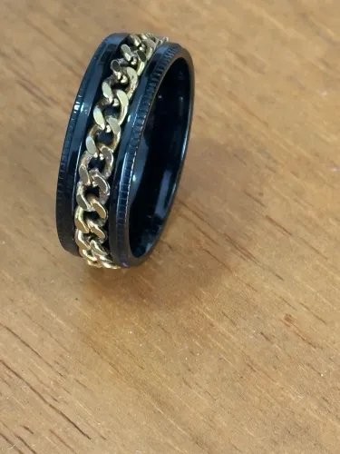 Anel aço preto e dourado de catraca Maravilhoso 