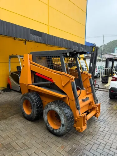 Mini carregadeira Case 1845C Bobcat Operacional 100%