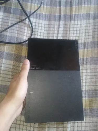 PS2 quebrado pra retirada de peça ou quem quer concertar