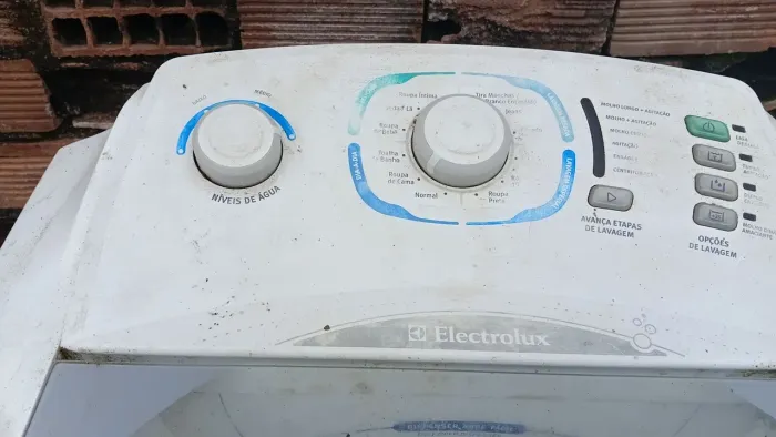 Máquina de lavar com defeito