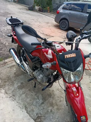 A MOTO ESTA COM KM ALTO POREM A MOTO ESTA ÓTIMA SÓ VOU VENDER PQ COMPREI OUTRA