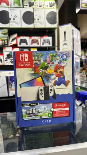 NINTENDO SWITCH OLED + MARIO BROS WONDER
