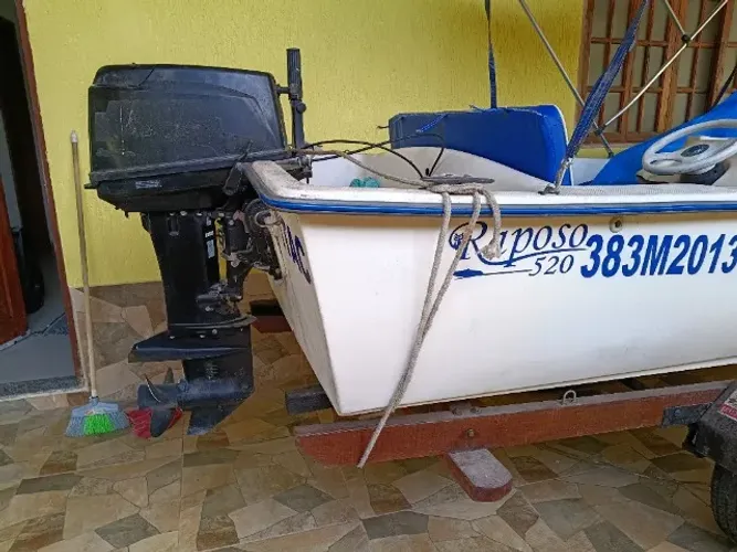 Raposo 520 motor Mercury 25hp, carreta Madenox. Dcs Ok. 
