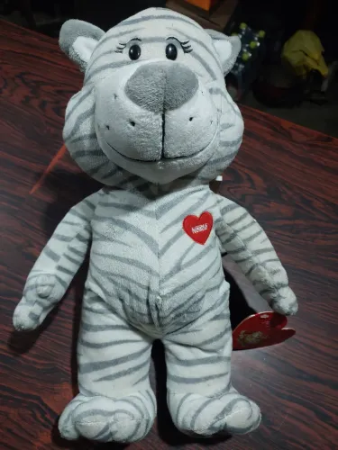Pelúcia Tigre Nestle...