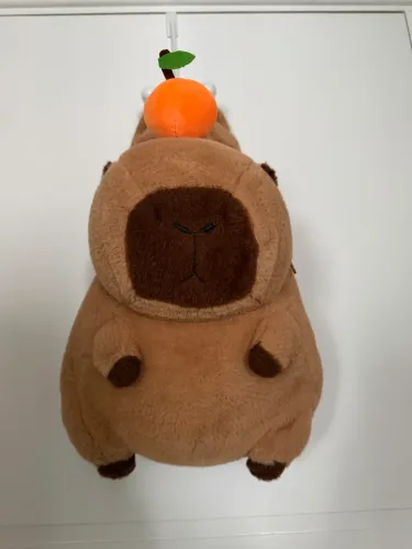 Mochila pelucia capibara