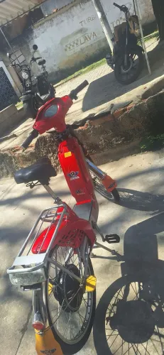 vendo uma bicicleta elétrica em perfeita combinação de uso linda 