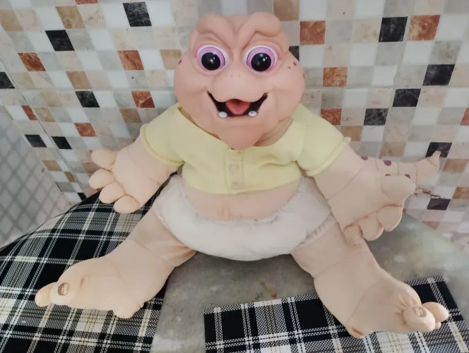Baby dinossauro anos 90 antigo