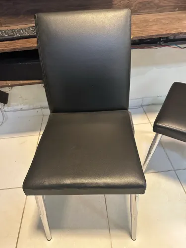 Cadeiras de inox acochoada