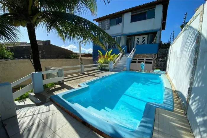 Quer tranquilidade e conforto? Venha financiar esta linda casa em Praia da Costa com 5/4 e