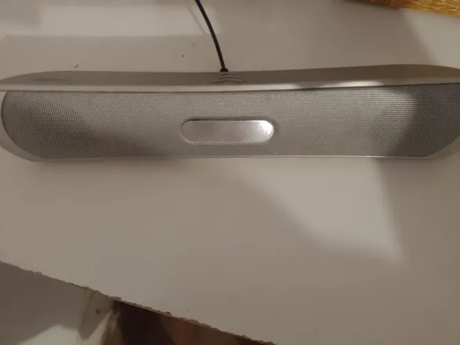 Caixa de som portátil Brookstone Audiomax. 