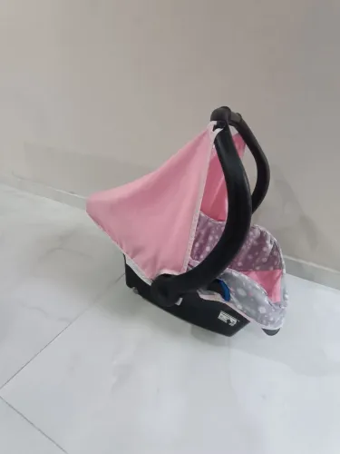 Bebê conforto tuty baby menina
