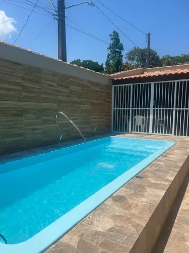 Casa com 03 dormitórios e área gourmet com piscina, à venda em Bertioga - SP