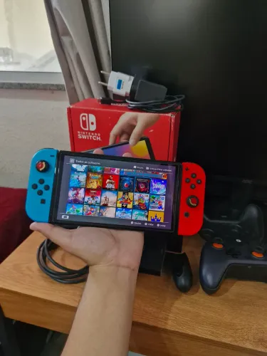 Nintendo switch oled desbloqueado 512gb + Controle T4 nova Lite
