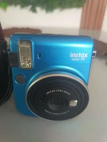 Câmera fujfilm instax 70 acompanha bolsa de couro uma das melhores no seguimento 