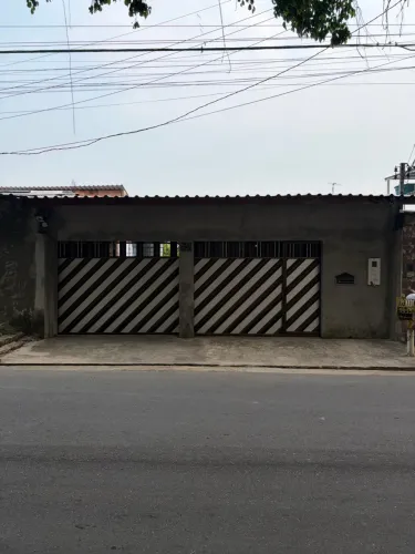 Terreno 8x25 (200 m²) com portões e garagem construída