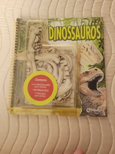 Livro dinossauros + quebra cabeça - Catapulta Júnior
