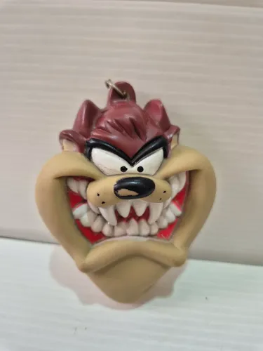 Taz Mania porta m0edas e trecos - 1997 Applause