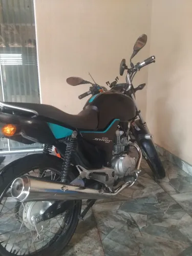 Moto impecável 