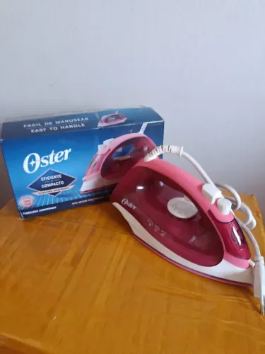 Ferro de passar Oster 220v novo