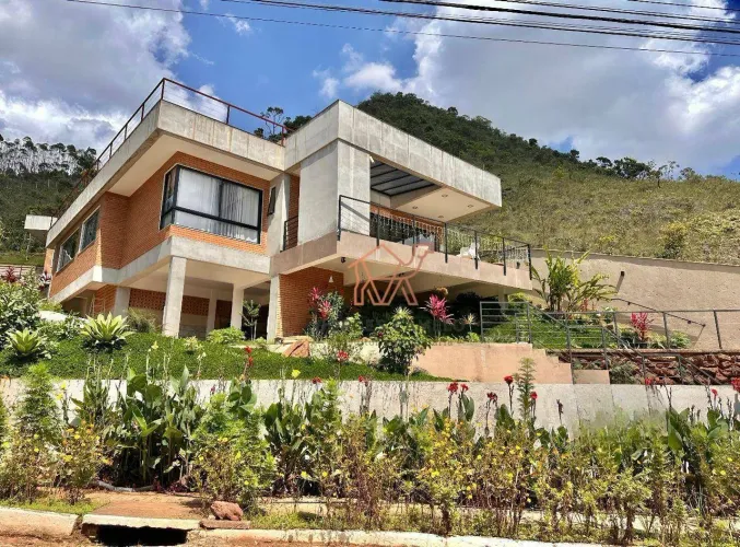 Casa com 3 dormitórios à venda, 271 m² por R$ 2.430.000,00 - Vile de Montagne - Nova Lima/