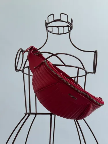 Pochete Schutz 90% COURO