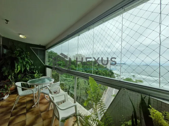 Apartamento frente mar com varanda e lazer na Praia das Asturias, Guaruja