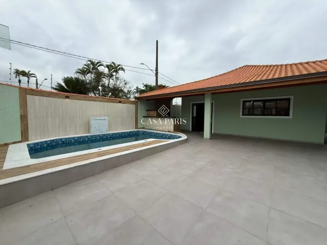 Casa residencial à venda na Praia Grande (Bairro Flórida) | 3 suítes | 4 vagas | Piscina
