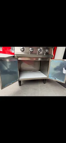VENDO UM FOGÃO 4 BOCAS ELVI PROFISSIONAL NOVO BAIXA PRESSÃO 