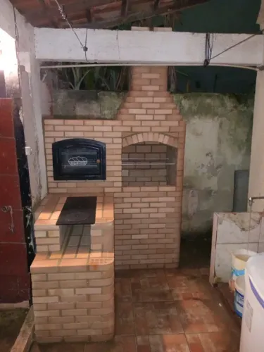 Churrasqueira forno blindado e fogão a lenha
